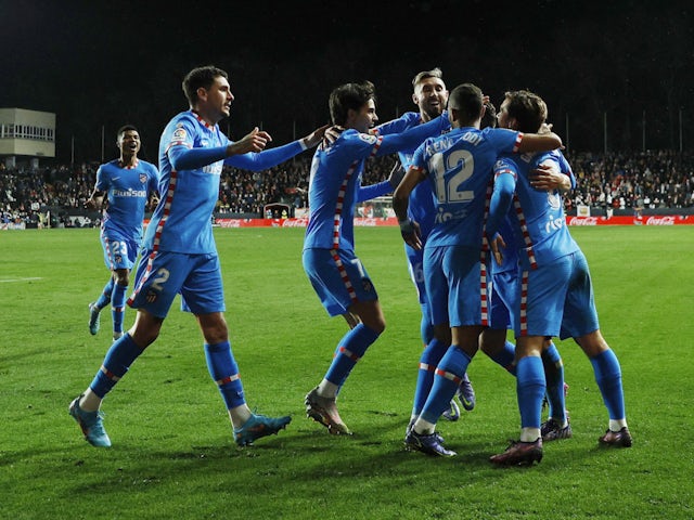 Atletico Madrid's Koke celebrates scoring their first goal with teammates on March 19, 2022