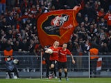 Rennes' Benjamin Bourigeaud celebrates scoring their first goal with Baptiste Santamaria on March 17, 2022