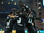 Juventus players celebrate after Sampdoria's Maya Yoshida scores an own goal and Juventus' first on March 12, 2022