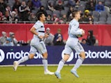 Sporting Kansas City midfielder Roger Espinoza (15) reacts after scoring a goal against the Chicago Fire during the second half at Soldier Field on March 19, 2022
