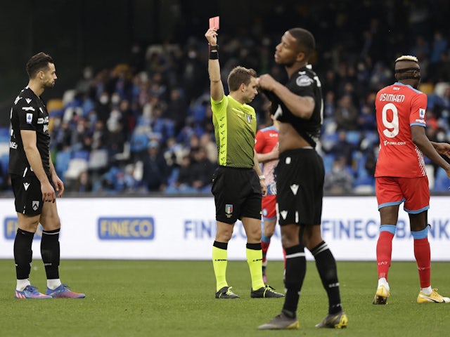 Udinese's Pablo Mari is shown a red card by referee Francesco Fourneau on March 19, 2022