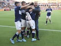 Vancouver Whitecaps FC head coach Vanni Sartini and teammates celebrate FC forward Lucas Cavallini (9) goal against the Houston Dynamo FC in the first half at PNC Stadium on March 12, 2022