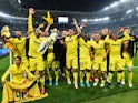 Villarreal's Gerard Moreno and teammates celebrate after the match on March 16, 2022