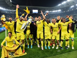 Villarreal's Gerard Moreno and teammates celebrate after the match on March 16, 2022