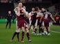 West Ham United's Declan Rice celebrates with Mark Noble after the match on March 17, 2022