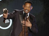 Will Smith collects his Best Actor award at the Critics Choice Awards on March 13, 2022