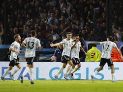 Argentina's Nicolas Gonzalez celebrates scoring their first goal with teammates on March 25, 2022