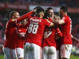 Benfica's Rafa Silva celebrates scoring their first goal with teammates on March 20, 2022