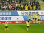 Borussia Dortmund's Marius Wolf celebrates scoring their first goal with teammates on March 20, 2022