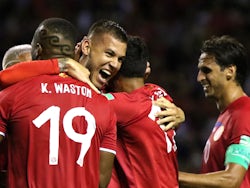 Costa Rica's Juan Vargas celebrates after the match with teammates on March 25, 2022
