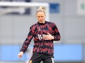 Diane Caldwell warms up for Manchester United in February 2022