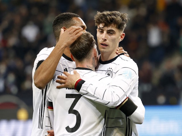 Germany's Kai Havertz scores their first goal with teammates on March 26, 2022