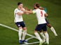 England's Harry Kane celebrates scoring their third goal with Declan Rice and Raheem Sterling on July 3, 2021
