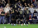 Los Angeles FC defender Jesus Murillo (3) celebrates with teammates after midfielder Ryan Hollingshead (24) scores a goal during the first half against the Vancouver Whitecaps FC at Banc of California Stadium on March 20, 2022