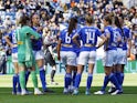 Leicester City Women players team huddle after Chelsea score their third goal on March 27, 2022