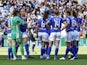 Leicester City Women players team huddle after Chelsea score their third goal on March 27, 2022