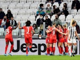 Lyon Women's Catarina Macario celebrates scoring their first goal with teammates on March 22, 2022