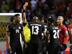 Canada's Mark-Anthony Kaye is shown a red card by referee Said Martinez on March 25, 2022
