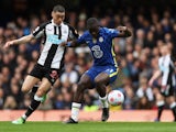 Newcastle United's Miguel Almiron in action with Chelsea's Malang Sarr, on March 13, 2022