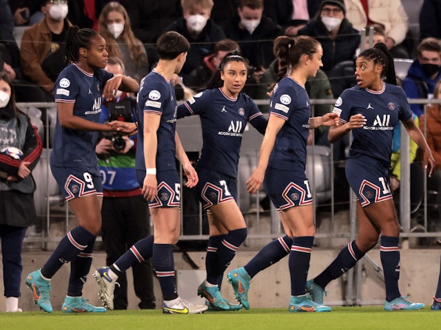 Paris Saint Germain Women's Marie-Antoinette Katoto celebrates scoring their first goal with teammates on March 22, 2022