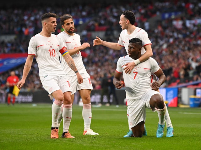 Switzerland's Breel Embolo celebrates scoring their first goal with teammates on March 26, 2022