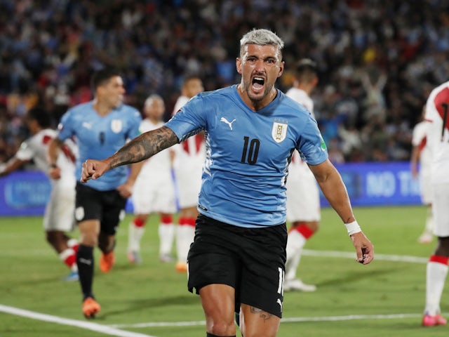 Uruguay's Giorgian de Arrascaeta celebrates scoring their first goal on March 24, 2022