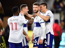 Vancouver Whitecaps celebrate the goal scored by defender Tristan Blackmon (6) against Los Angeles FC during the first half at Banc of California Stadium on March 20, 2022