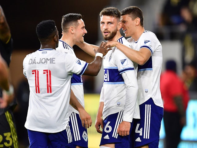 The Vancouver Whitecaps celebrate defenseman Tristan Blackmon (6)'s goal against Los Angeles FC in the first half at Banc of California Stadium on March 20, 2022