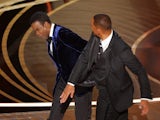 Will Smith hits Chris Rock during the Oscars on March 27, 2022