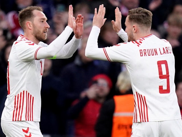 Denmark's Christian Eriksen celebrates scoring their third goal with Jacob Bruun Larsen  on March 29, 2022