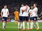 England's Tyrone Mings celebrates scoring their third goal with Declan Rice, Harry Kane and teammates on March 29, 2022