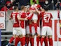 Freiburg's Nils Petersen celebrates scoring their first goal with teammates on April 2, 2022