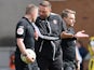 Bolton Wanderers manager Ian Evatt approaches referee Samuel Barrott at half time on April 2, 2022