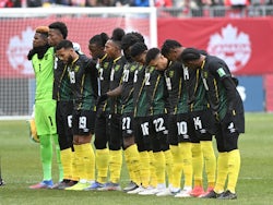 The Jamaica national team stand for the anthems before playing Canada in a FIFA World Cup qualifying soccer match at BMO Field on March 27, 2022