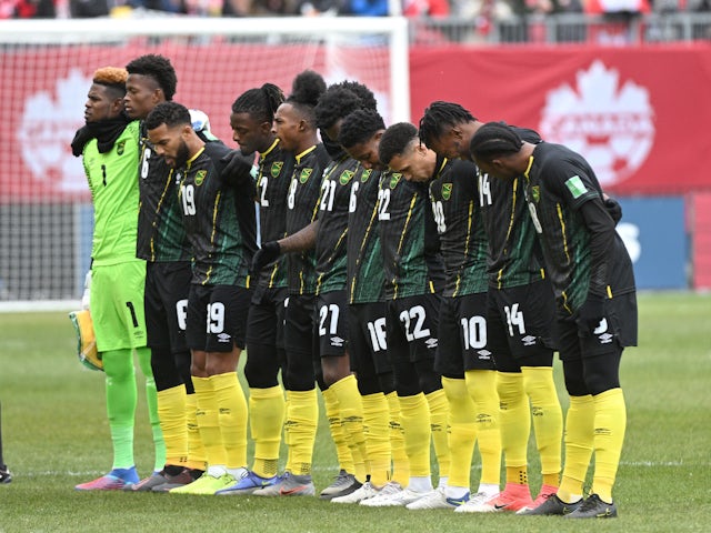 The Jamaican national team stands for the national anthem before facing Canada in a FIFA World Cup qualifier football match at BMO Field on March 27, 2022.