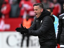 Canada head coach John Herdman watches game action in the first half against Jamaica in a FIFA World Cup qualifying soccer match at BMO Field on March 27, 2022