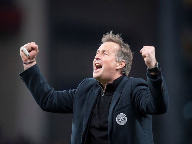 Denmark's Kaspar Jurmand celebrates after the match on 29 March 2022
