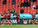 Bayer Leverkusen's Lucas Alario celebrates scoring their first goal on April 2, 2022