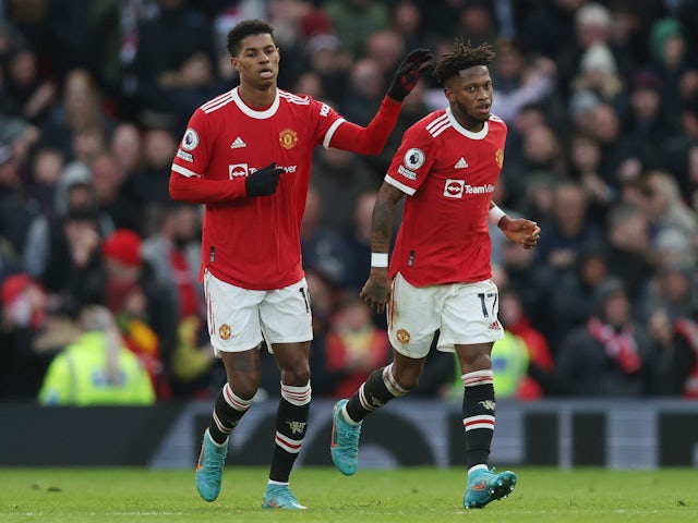 Manchester United's Fred celebrates scoring their first goal with Marcus Rashford on April 2, 2022
