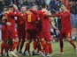 Montenegro's Milutin Osmajic celebrates scoring their first goal with teammates on March 28, 2022