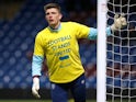 Burnley's Nick Pope wears a shirt in support of Ukraine during the warm up before the match on March 1, 2022