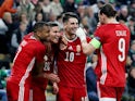Hungary's Roland Sallai celebrates scoring their first goal with teammates on March 29, 2022