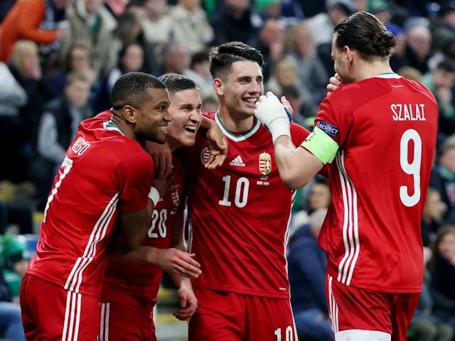 Hungary's Roland Sallai celebrates scoring his first goal with his teammates on March 29, 2022