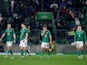 Northern Ireland's Ciaron Brown, Paddy McNair, Dion Charles and Shayne Lavery react after the match on March 29, 2022