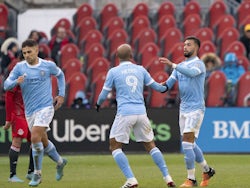 New York City forward Heber (9) celebrates a late goal with New York City midfielder Valentin Castellanos (11) against Toronto FC at the end of the second half at BMO Field on April 2, 2022