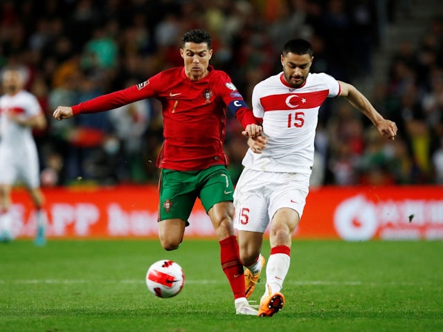 Portugal's Cristiano Ronaldo in action with Turkey's Ozan Kabak on March 24, 2022