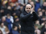 Manchester City manager Pep Guardiola applauds fans after the match on April 2, 2022