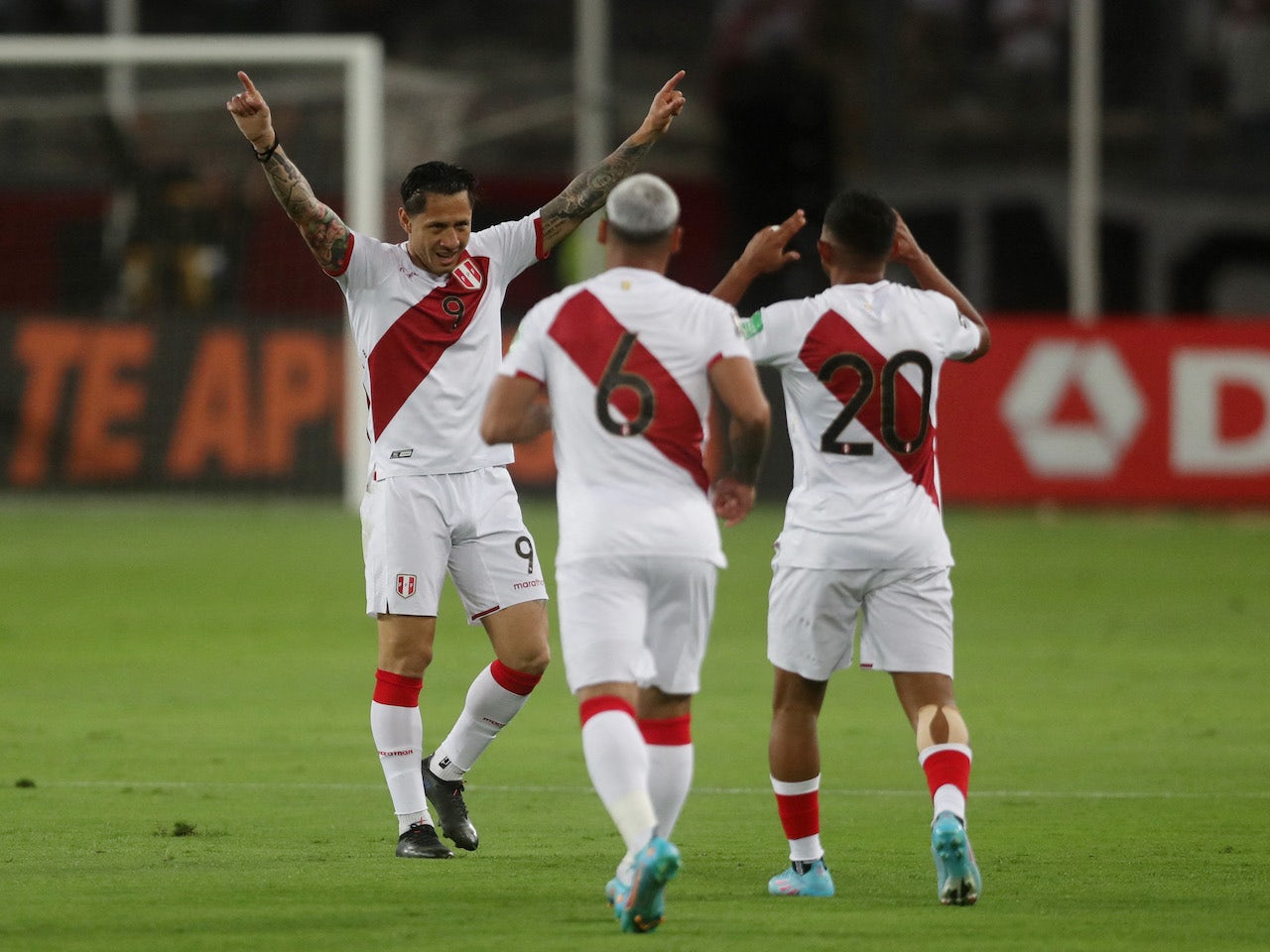 Peru's Gianluca Lapadula celebrates scoring their first goal with ...