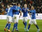 Italy's Bryan Cristante celebrates scoring their first goal with teammates on March 29, 2022