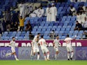 United Arab Emirates' Harib Abdalla Suhail celebrates scoring their first goal with teammates on March 29, 2022